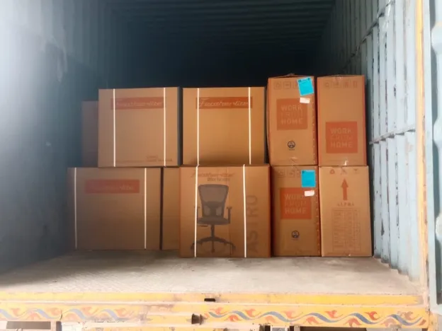 Corporate office relocation team moving furniture